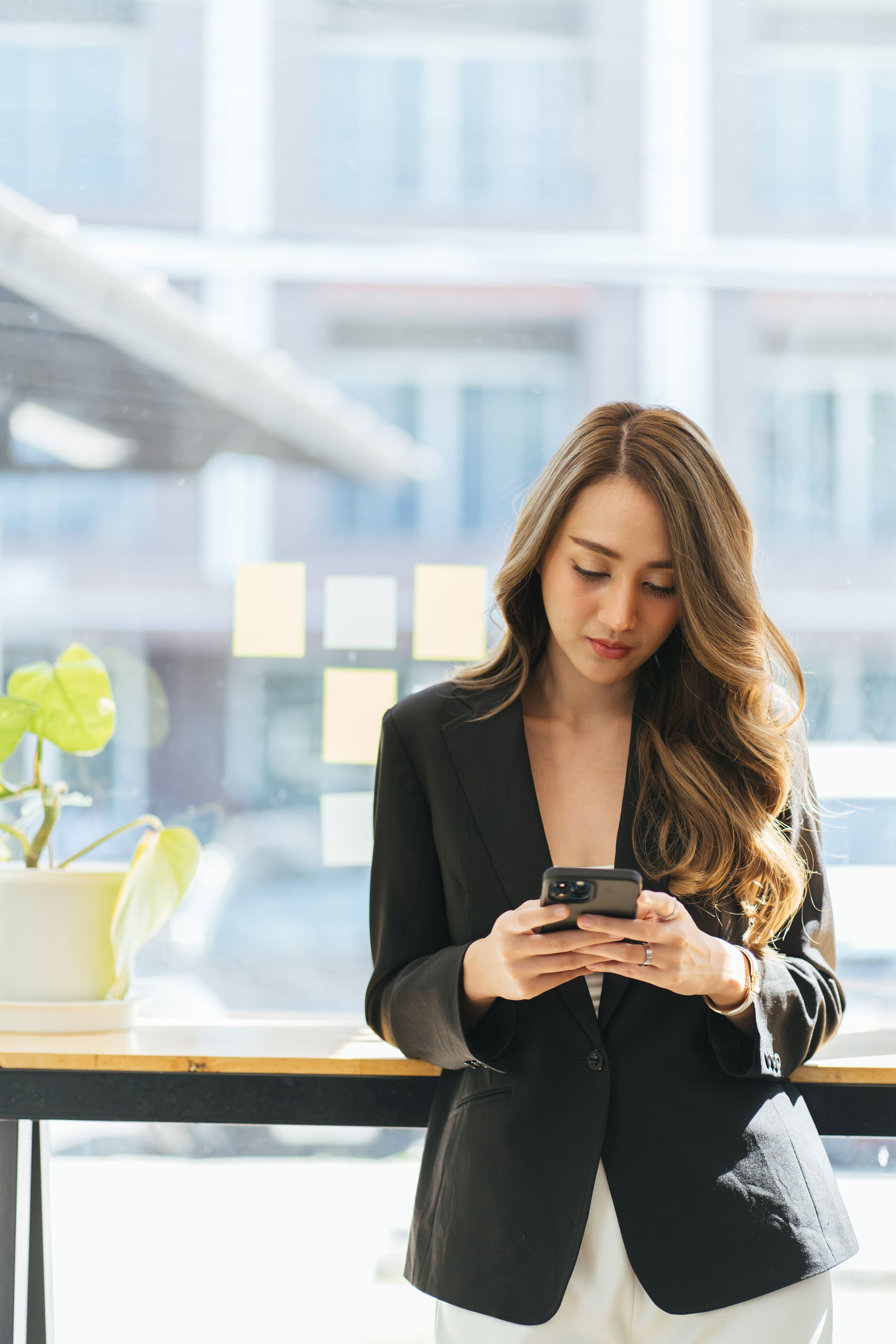 person-in-office-on-phone